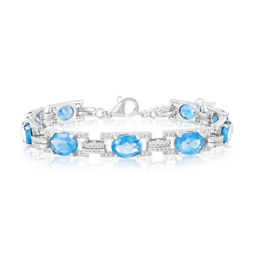 Cartier Inspired Oval Cut Swiss Blue Topaz & White Topaz Tennis Bracelet in Italian Sterling Silver